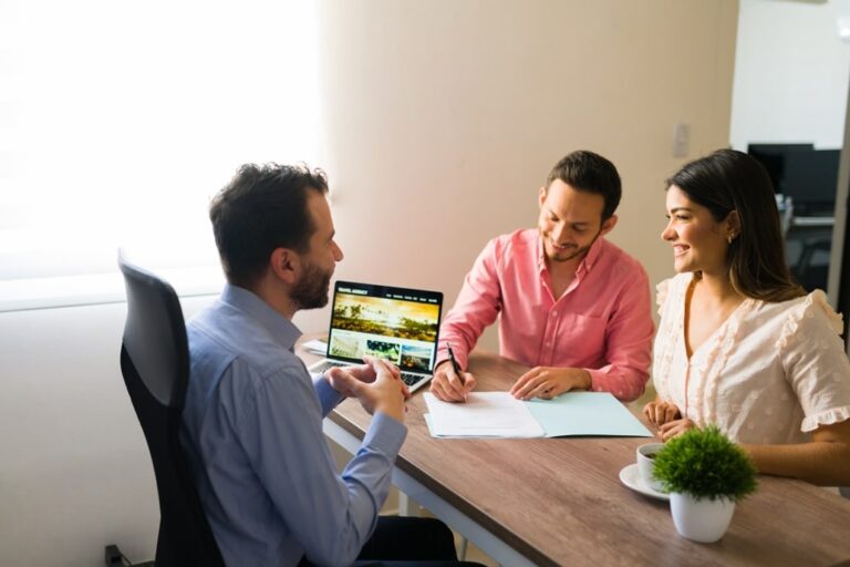 Client and travel agency rep talking about travel plans
